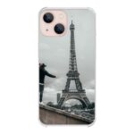 Man beside eiffel tower
